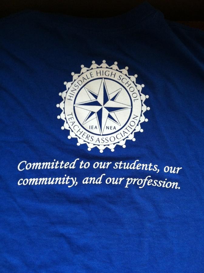 The logo and values that HHSTA shares on its t-shirt. 