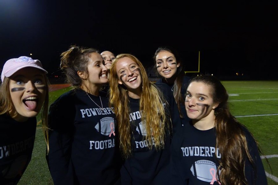 From Left: Seniors Devyn Callen, Brianna Ary, Marianna Garcia, Mason Spillers, Lindsay Boutchia, and Sarah Lowe celebrate their victory over the juniors after the 2014 Powder Puff game.