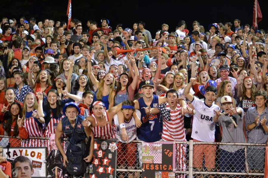 The Hinsdale Central student section shows its pride on America day at Dickinson Field during the Sept. 26 game against Glenbard West.