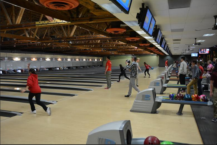 Students participate in the free bowling event at Suburbanite Bowl. 