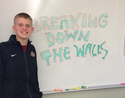 Michael Claussen, junior and co-president of Breaking Down the Walls White,  leads the club in its anti-bullying efforts.  