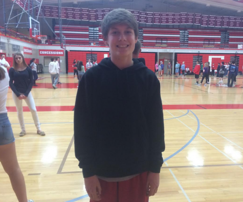Sam Schiavitti, freshman, takes a break from the freshman square dancing unit in gym. 