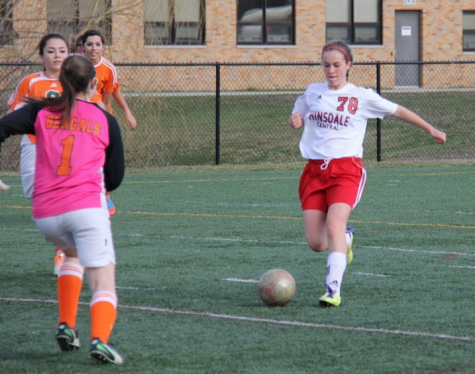 Sophomore Taylor Reinhardt prepares to kick a goal; Reinhardt has played soccer for 10 years and enjoys the sport. 