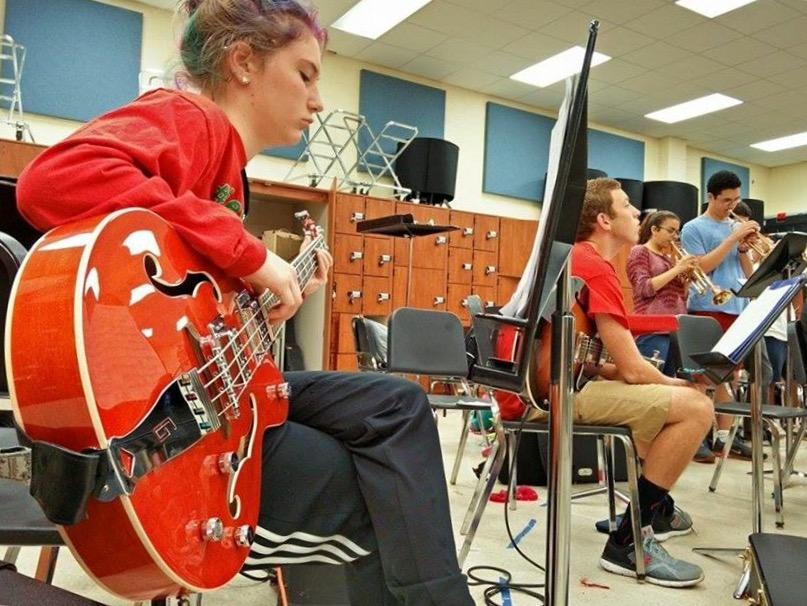 Katherine Morrone, junior, plays the electric bass guitar during Jazz Lab.