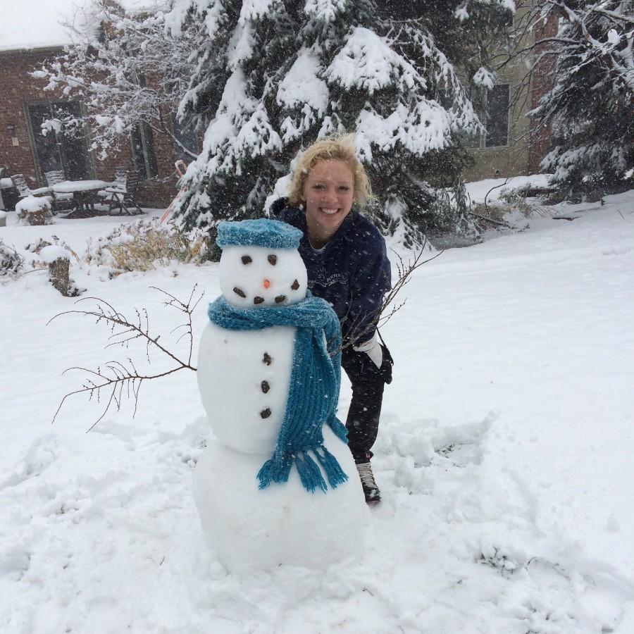 Torie Chiaramonte, junior, spends time playing in the snow over holiday break. 