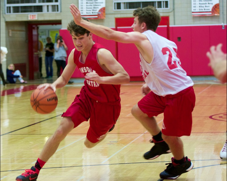 Jack Hoiberg guards Chris Eck during the annual Red and White Scrimmage held in November each year. 