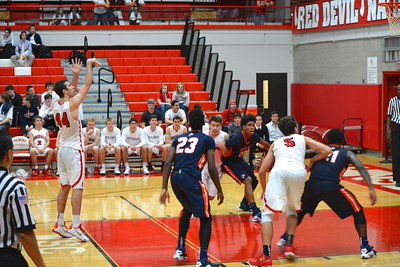 Senior Peter Blust lines up for free throw. He averaged 18 points against Oak Park River Forest on Dec. 11. 