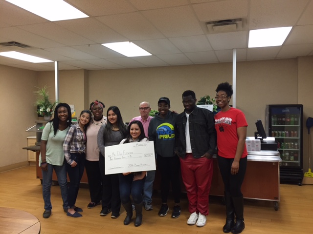 Black History Month student committee presented the check to Mr. Fleisher in order to benefit a school in need of musical instruments. 