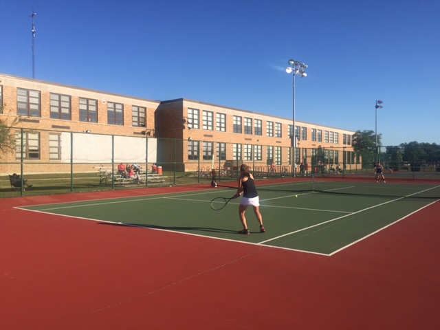Varsity Girls Tennis practice their skills in pursuit of a state championship.