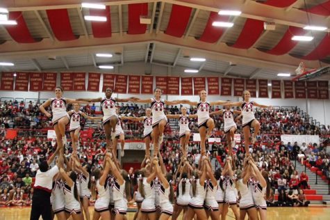 The JV and Varsity cheerleaders performed during the Homecoming pep rally on Sep. 30.