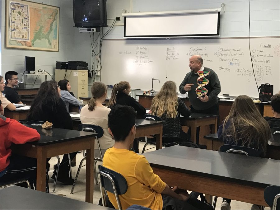 While teaching his class about the structures found in DNA, Mr. Gawlik still manages to make his class laugh.