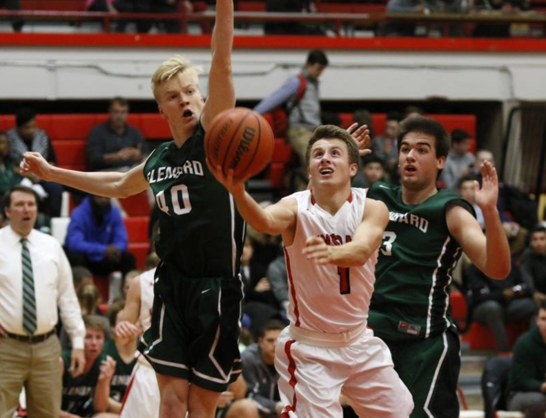 Jack+Hoiberg%2C+senior%2C+attempts+a+layup+in+the+first+matchup+against+Glebard+this+season+on+Jan.+6+in+the+Hinsdale+Central+main+gym.+