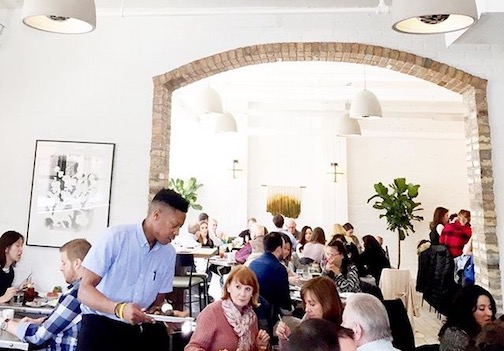 Quiet chatter fills Eden's dining area while people come in for brunch. 