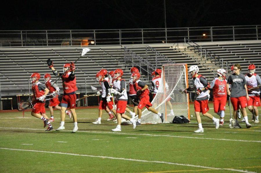 Boys+Varsity+Lacrosse+practices+on+Dickinson+field+on+the+evening+of++March+8.