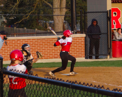 Shortstop Julia Chatterjee swings at a pitch on April 13. The team won 8-6 against Leyden High School.