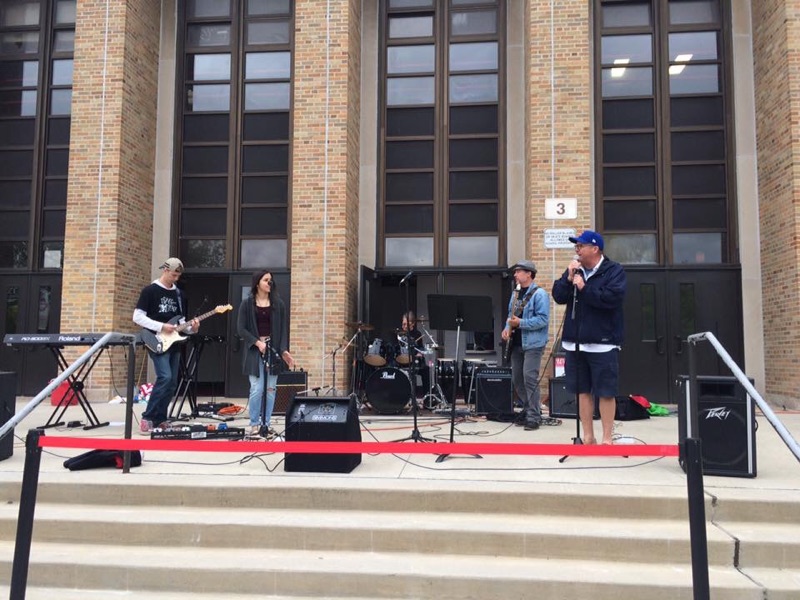Student band Black-Jack jams out in front of the school at the festival.