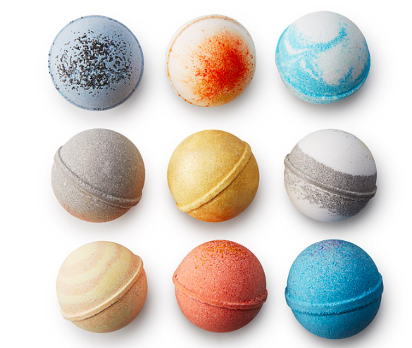 Give her some space for herself with this solar system bath bomb set.