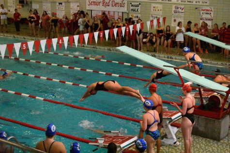 The girls swim and dive team faced Glenbard West Thursday Sept. 22. This meet celebrated the class of 2018 seniors, who are Sydney Albert, Caroline Bowater, Stephanie Bowater, Hollis Clark, Micaela Dugan, Madeleine Fowler, Emily Graham, Peyton Lienhart, Maggie Neil, Helen Smith, Maud Willems, Olivia Fix, Antonia Ioannou, Sara Katsis, Stephanie Rakos, Grace Thrana, Paige Thrana, and Angela Wong. 	
