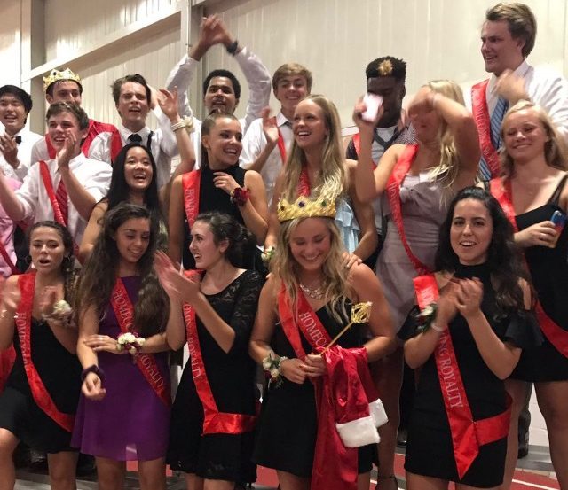 The court celebrates at the dance after Marshall Demirjian and Kelly Nash were crowned 2017 Homecoming King and Queen.