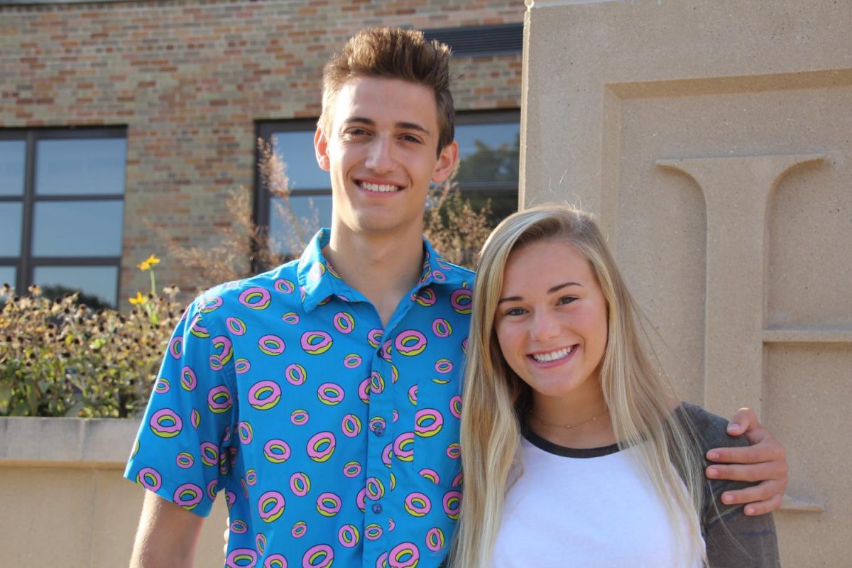 Seniors Marshall Demirjian and Kelly Nash pose for a photo leading up to the announcement at the homecoming dance that they had been named king and queen. 