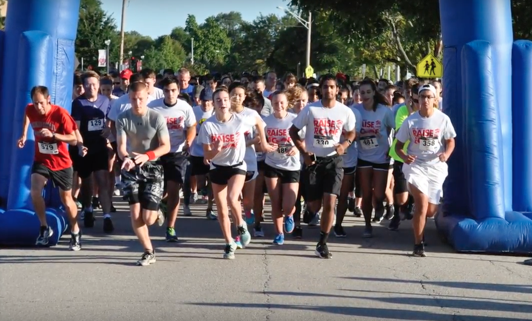 Participants charge across the starting line to begin the race at last years 5K.