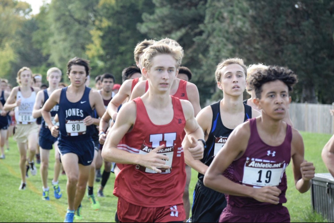 Matt Kusak, junior member of the varsity boys cross country team, runs during a previous meet.