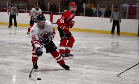 Rocky Araujo, junior, handles the puck during the game on Saturday, Oct. 7. Araujo was responsible for both of the team's goals that night.