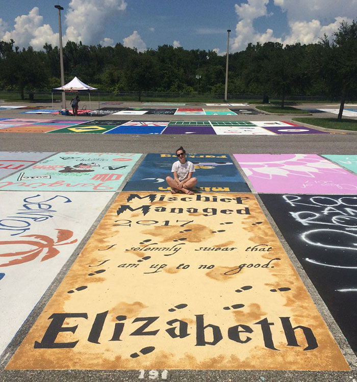 West Orange High School in Florida allows its students to paint their parking spots, which is what Central is trying to accomplish with this fundraiser.  However, the school does not guarantee that the spot seniors paint will be designated as their parking spot. 