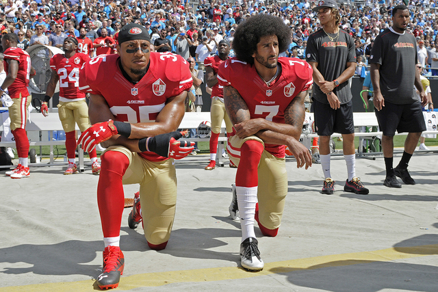 Players Colin Kaepernick (right) and Eric Reid (left) first brought attention to this issue by taking a knee on Sunday, Sept. 18, 2016.