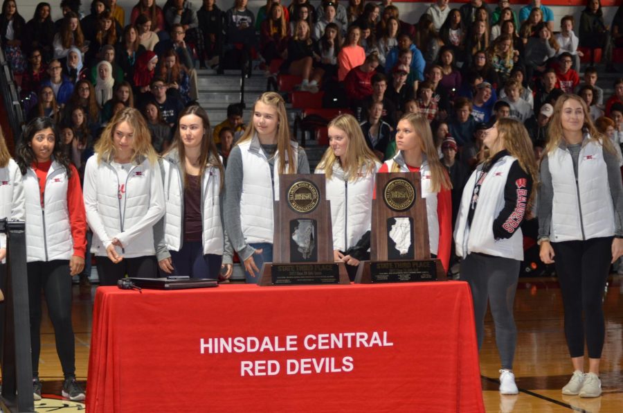 The girls varsity golf team was honored alongside  other teams in front of the whole school for their accomplishments this season.