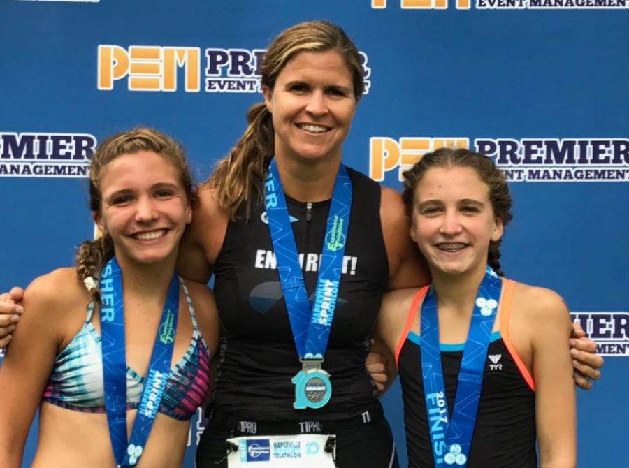 The Brunses competed in the Naperville Sprint Triathlon in August.  “It was a pretty cool moment when Lindsey, Molly and I each took first place in our Age Groups at the Naperville Sprint Triathlon and got to take turns standing at the top of the podium,” Betsy said.