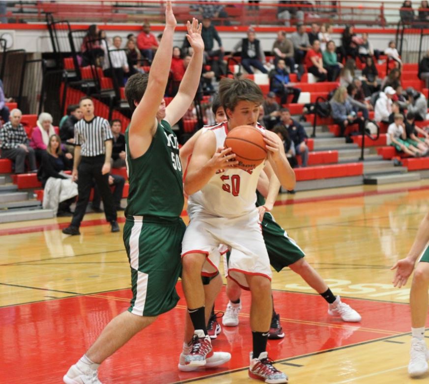 Sophomore Phillip Borhani guards against York in a tight game. 

