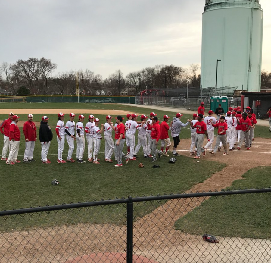 The team takes the field post-game to shake hands with their opponents on Monday, April 23. 