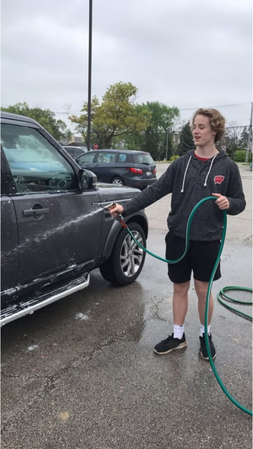 David Brynan, freshman class board vice president, was one of the students who took part in the car wash held in the senior lot on Saturday, May 19. 