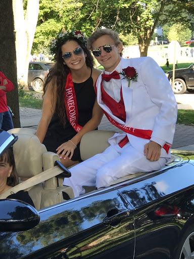 Seniors Gabby Costello and Thomas Williams take part in the annual Homecoming Parade on Saturday, Sept. 22. 
