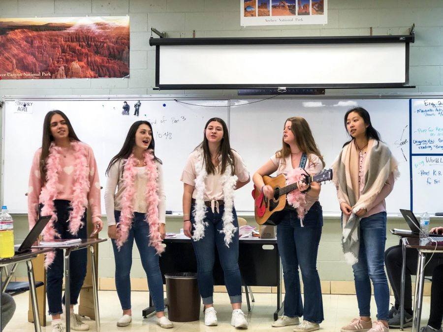 A group of senior girls perform singing valentines on Feb. 14.