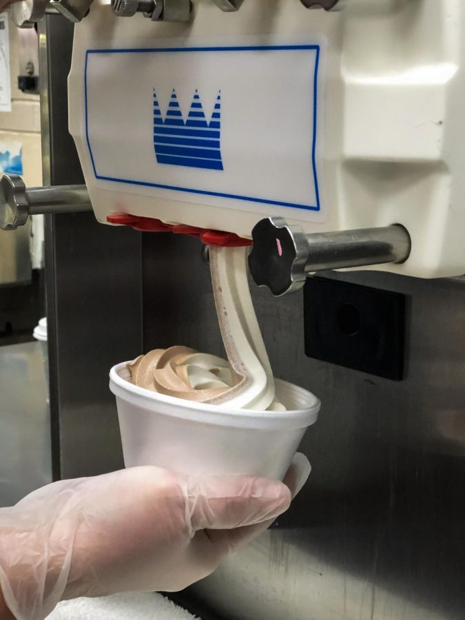 In contrast with the prepackaged frozen yogurt the cafeteria used to sell, cafeteria staff now swirl frozen yogurt right before students eyes immediately after ordering. 