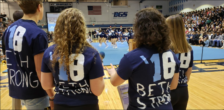 Teachers at Downers Grove South High School wear shirts that honor Beth Dunlap.