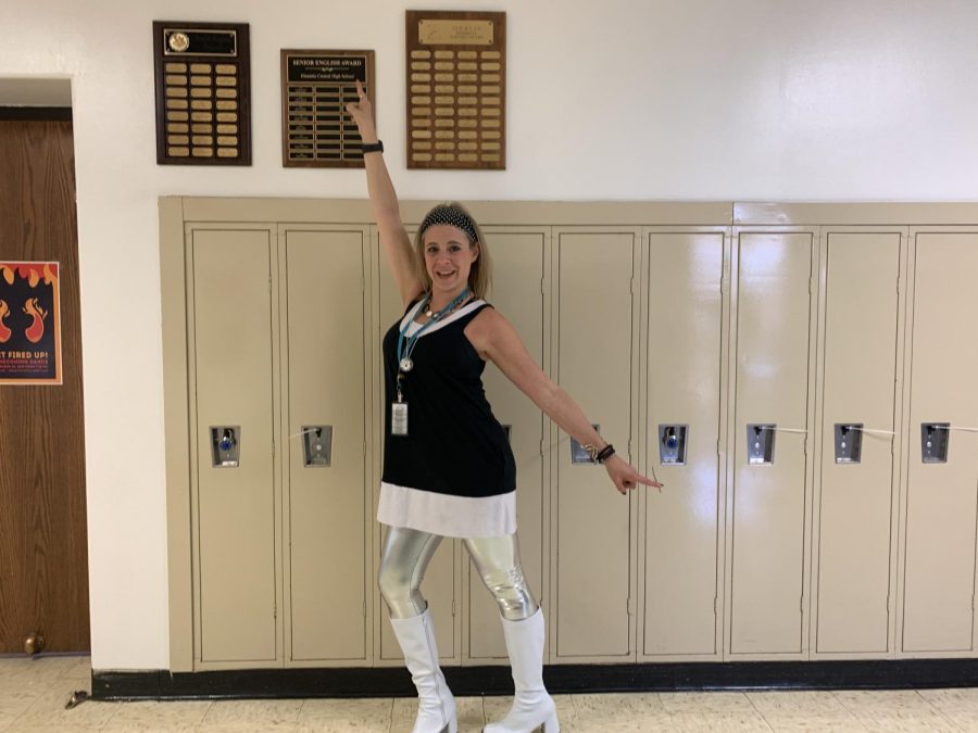 Ms. Hiffman, English teacher, dressed up for disco day with boots and metallic leggings. 