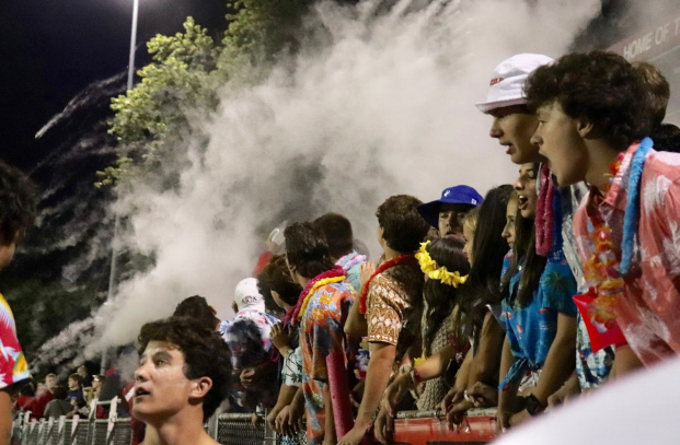 The student section celebrated each touchdown with baby powder and confetti.