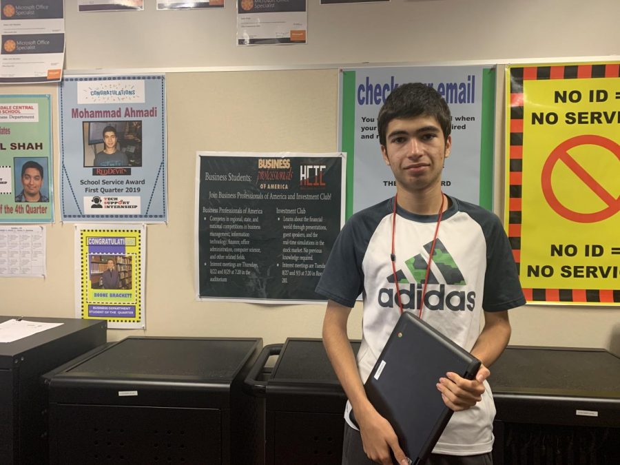 Mohammad Ahmadi, junior, received the School Service Award after offering to help Mrs. Barb Deane, technology specialist, get the Chromebooks ready for this school year. 