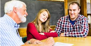 Teachers meet with children’s parents to discuss grades and how a student is doing in a certain class. 