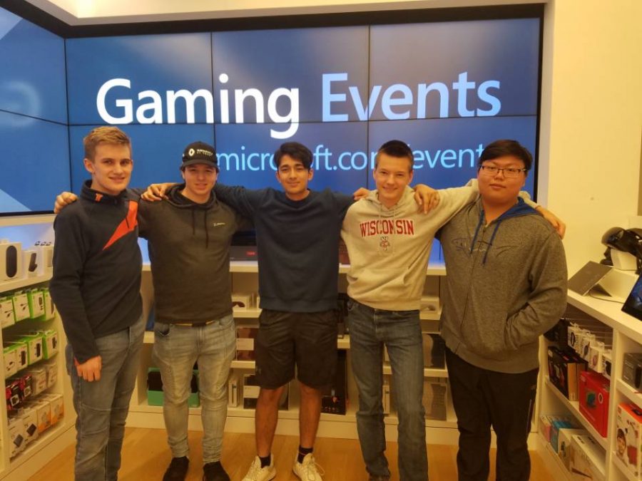 Some of the E-sports club members pose for a group picture at one of their gaming events. 