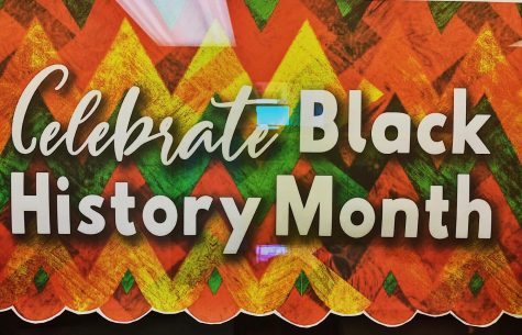 Outside of the library, Black History Month posters are displayed to celebrate diversity within Central.