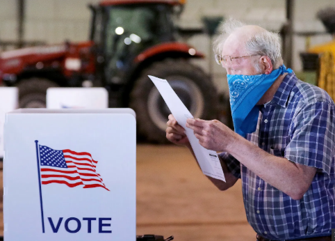 Voters in Wisconsin head to the polls to vote despite fears of the coronavirus. 