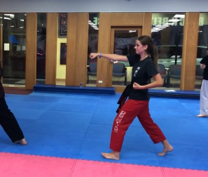 Ann Haarlow, a second-degree black belt, practices her form in preparation for her third-degree testing in the spring at Black Belt Excellence.