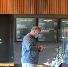 Gregory Schram, a recently retired teacher, getting a drink at Starbucks, glad he isn’t still teaching.