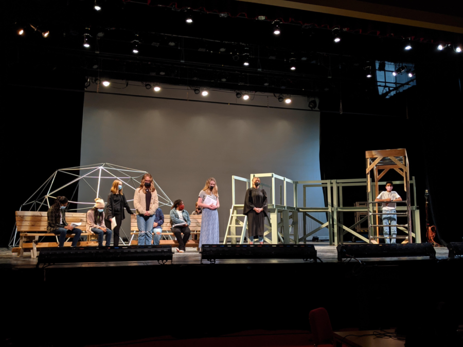 The cast of The Laramie Project practices on the stage to prepare for their performances on Oct. 21 and Oct. 23.