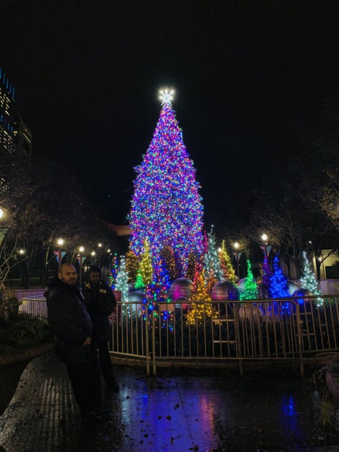 Watchguards guard the Official Christmas Tree after the park closes at 9 p.m. 