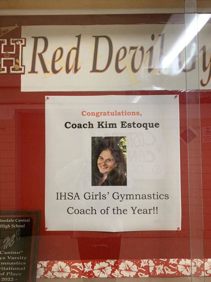 Coach+Kim+Estoque+received+the+title+of+IHSA+girls+gymnastics+coach+of+the+year+for+2021-2022.